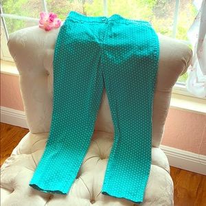 New York & company teal polka dotted Capri pants.